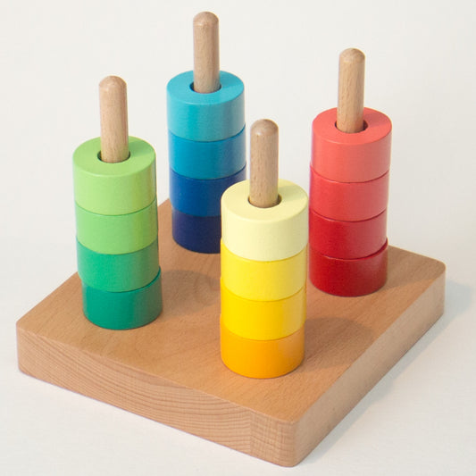 Montessori toys in New Zealand: Rainbow Discs on Four Dowels