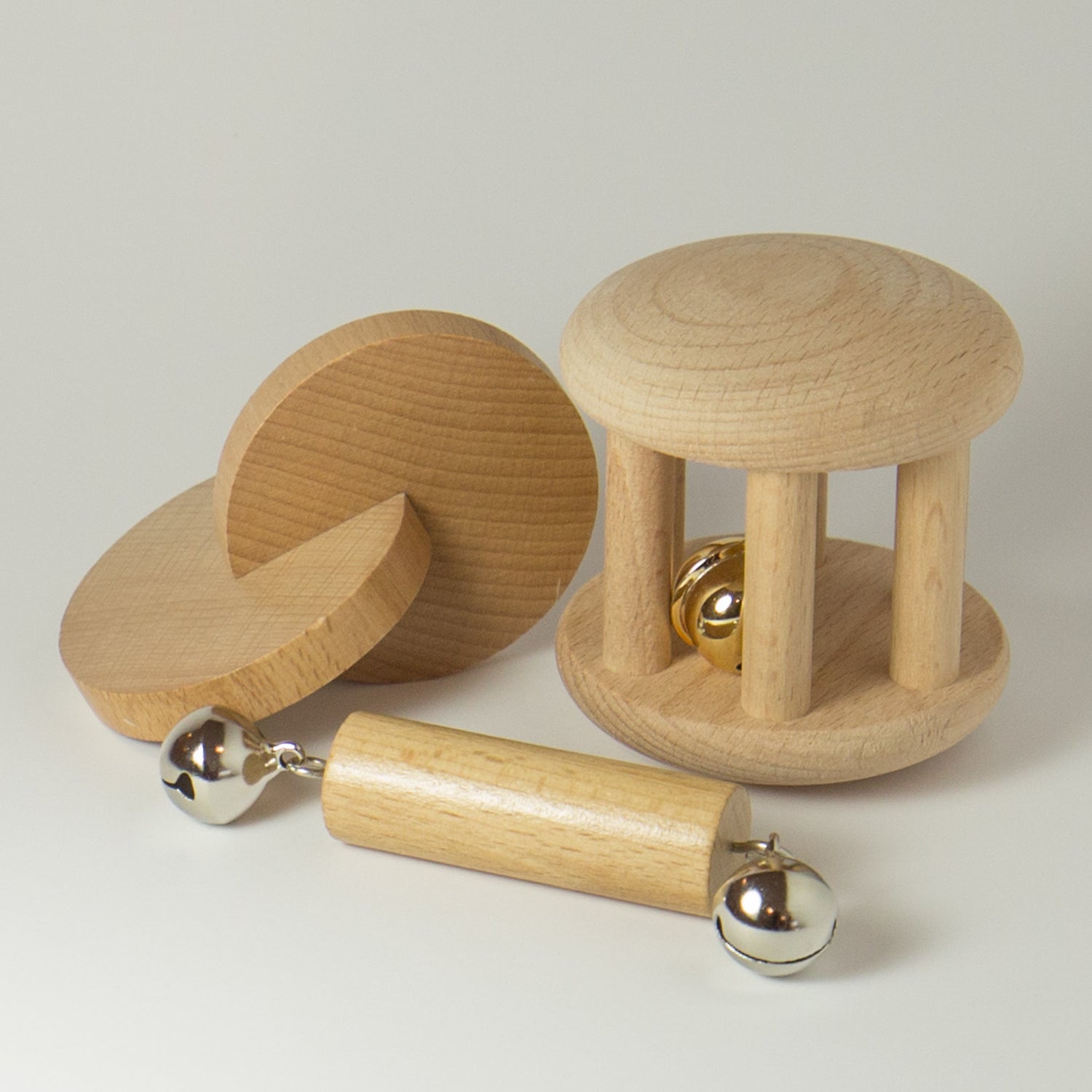 Montessori toys Australia: Rattles (Dowel with Bells, Cylinder with Bells, Interlocking Discs)