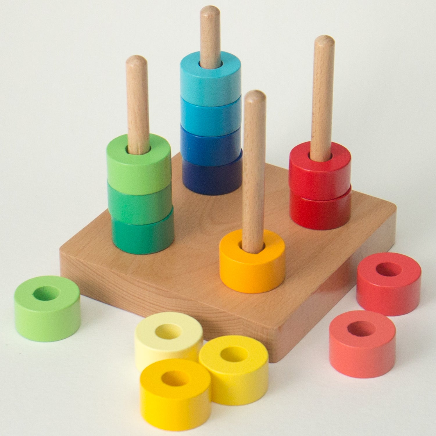 Montessori toys Australia: Rainbow Discs on Four Dowels